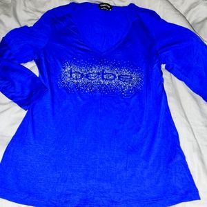 New bebe strech shirt